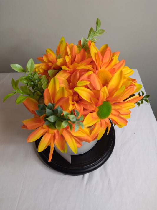 Yellow flower arrangement in vase